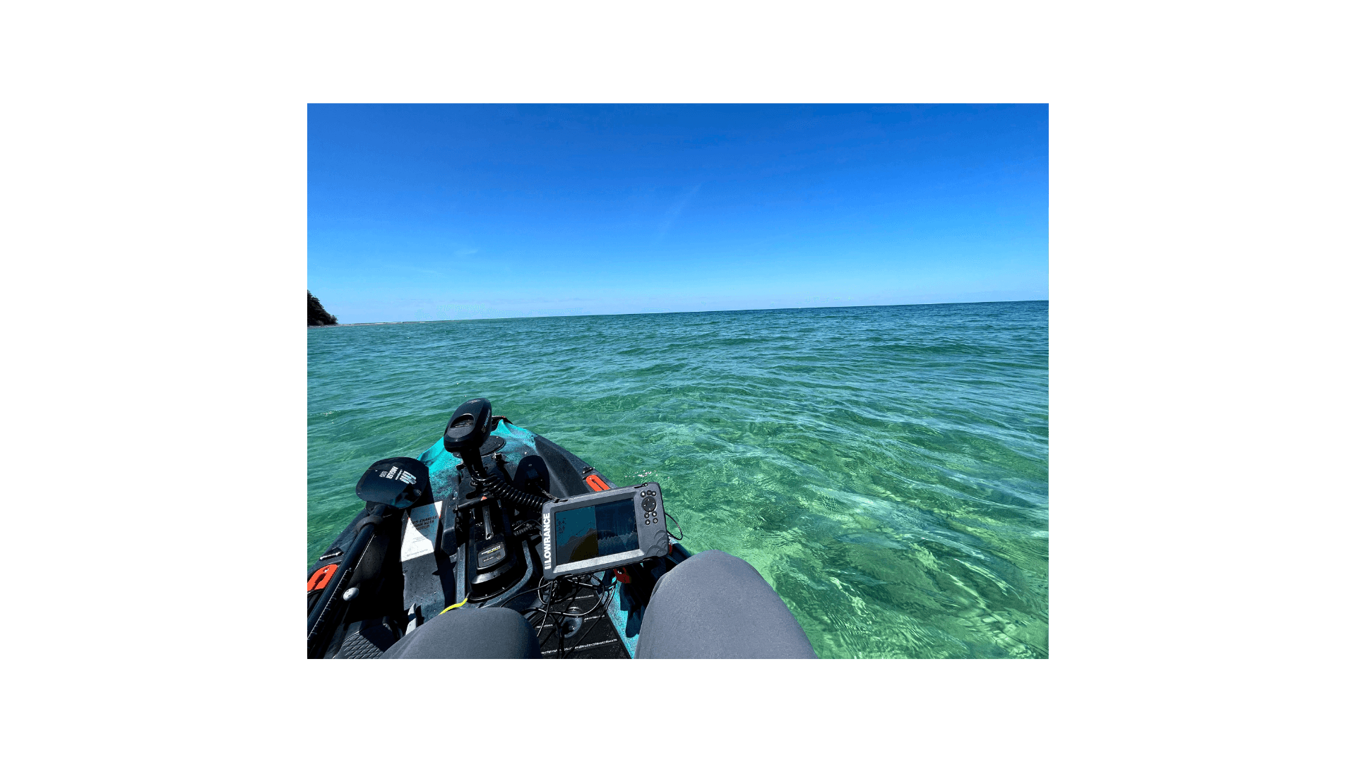 Old Town Autopilot kayak underway on Lake Michigan with onboard electronics