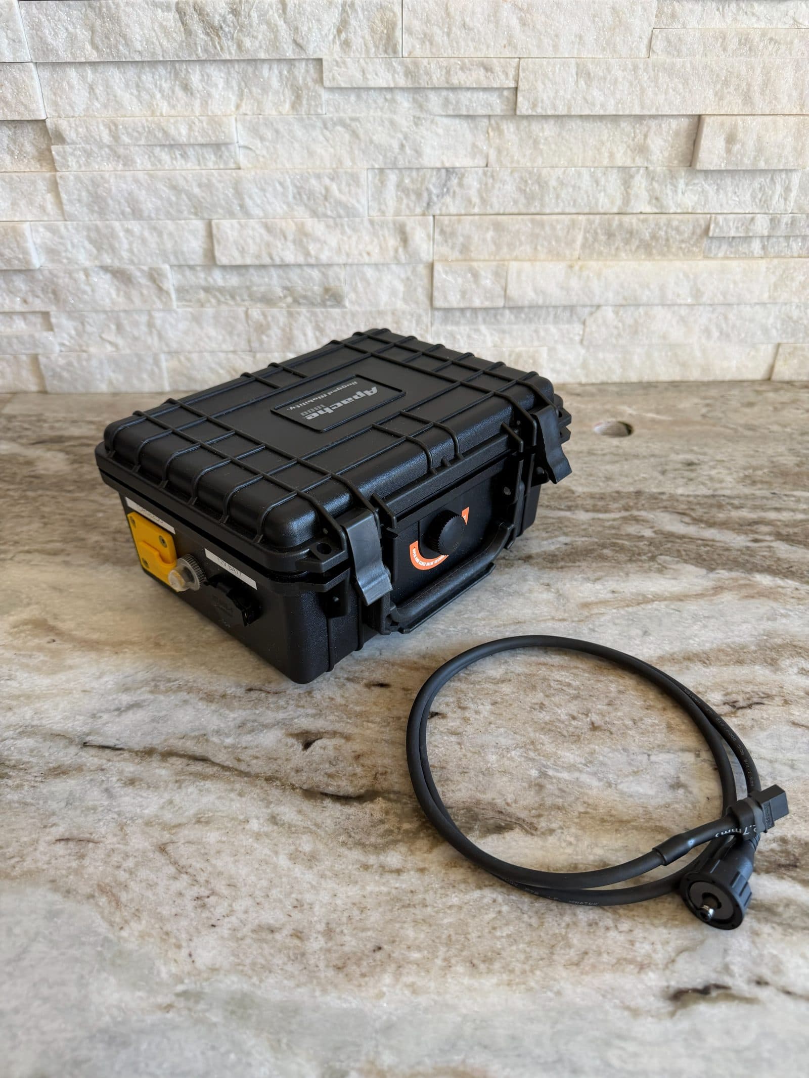 Closed Reactor Flux prototype enclosure with charging cable