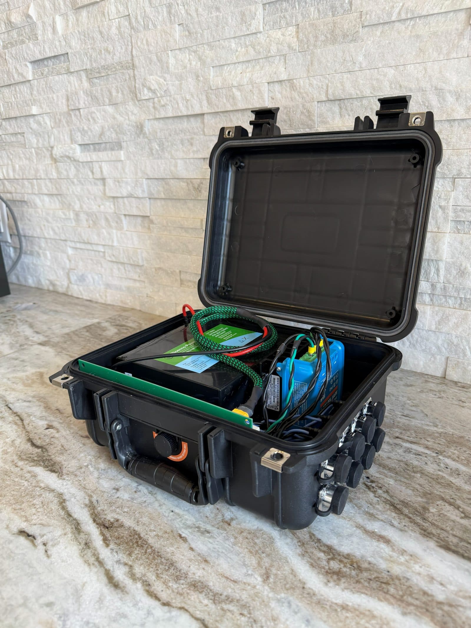 Open Reactor prototype showing internal battery, wiring, and electronics